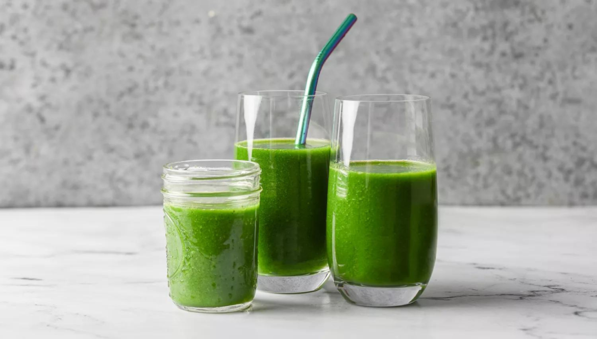 Detox Island Green Smoothie in Glass Cups Glass cups filled with Detox Island Green Smoothie
